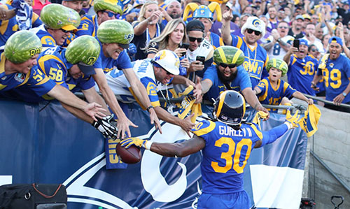 Todd Gurley high fives the melonheads after a TD